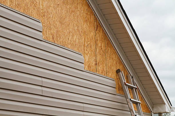 Professional Siding Replacement technician working in Chestnut Hill, MA